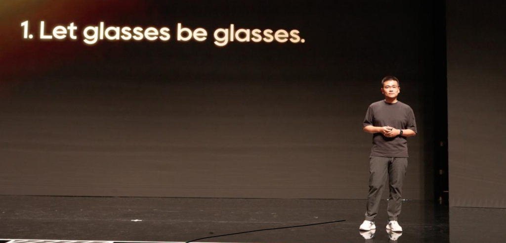 Moonix AI glasses launch event keynote presentation showing ultra-thin design philosophy