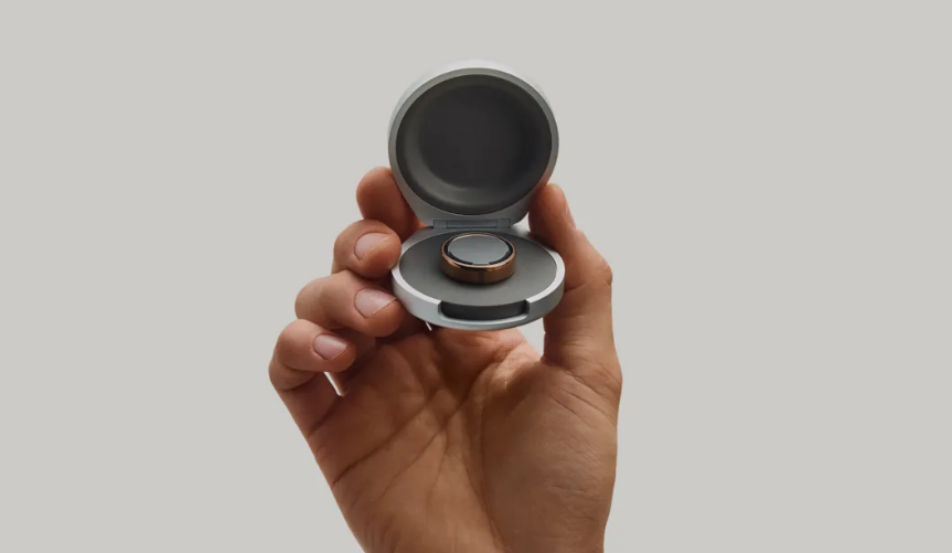 Oura Ring 5 charging case in hand